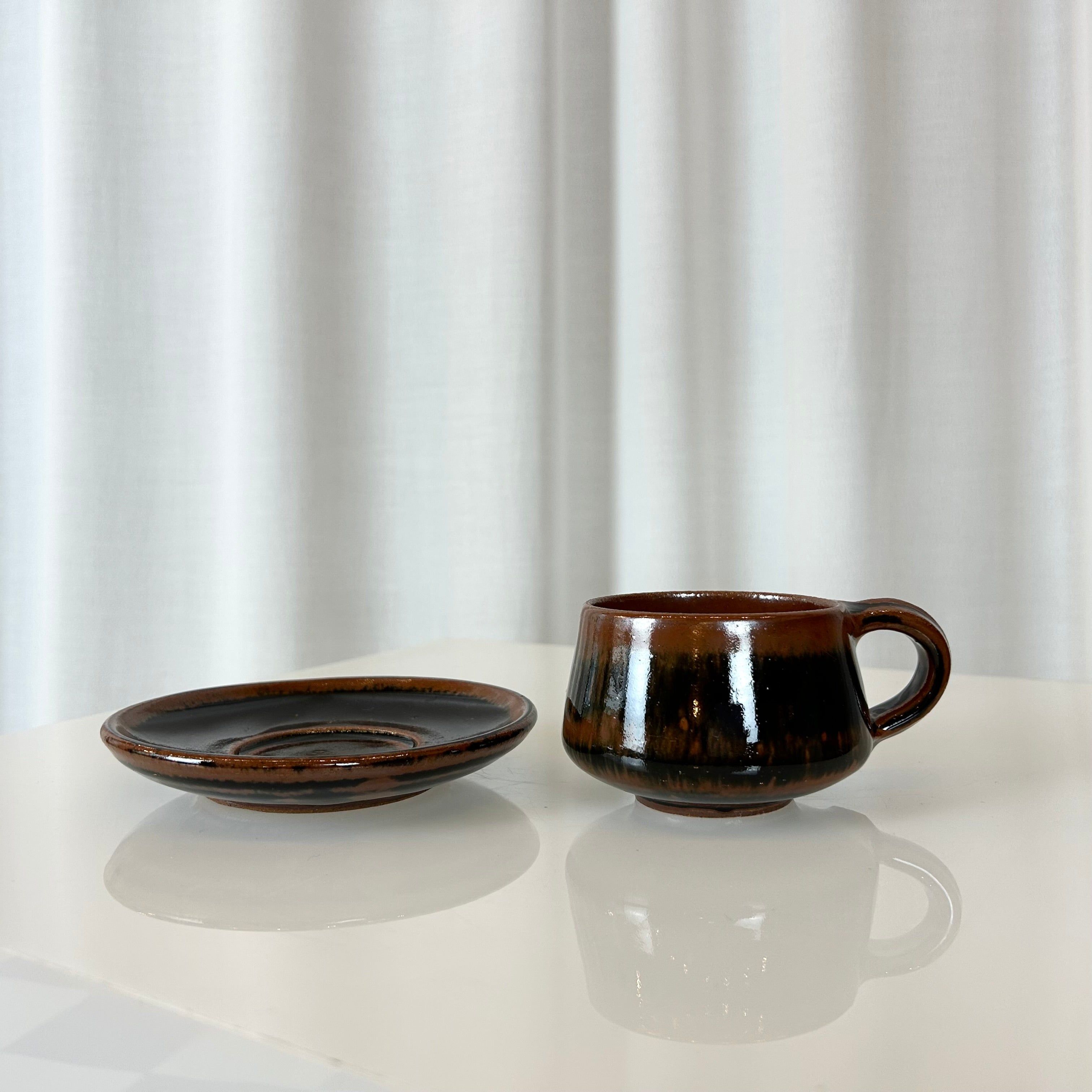  Ceramic cup and saucer from Aylesford