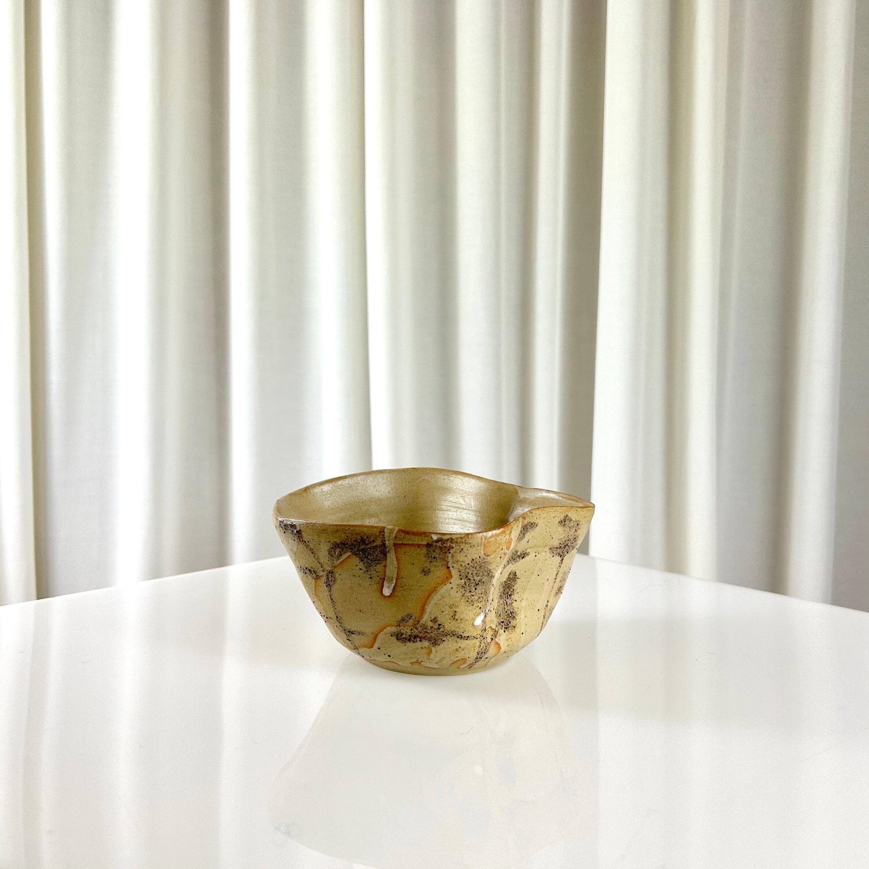 Ceramic beige bowl with pattern