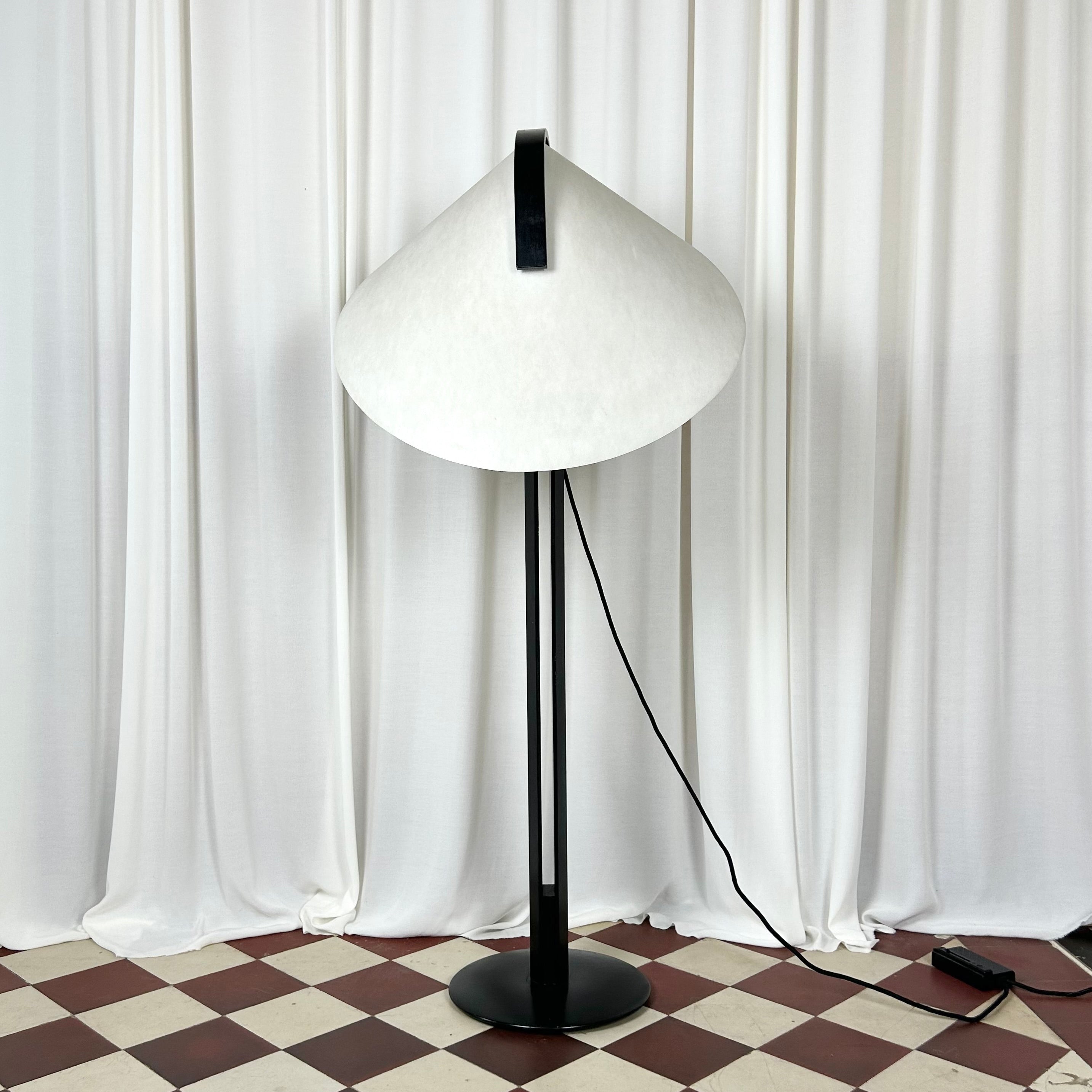 Front image of a black and white 1970's floorlamp by the Danish manufacturer Domus