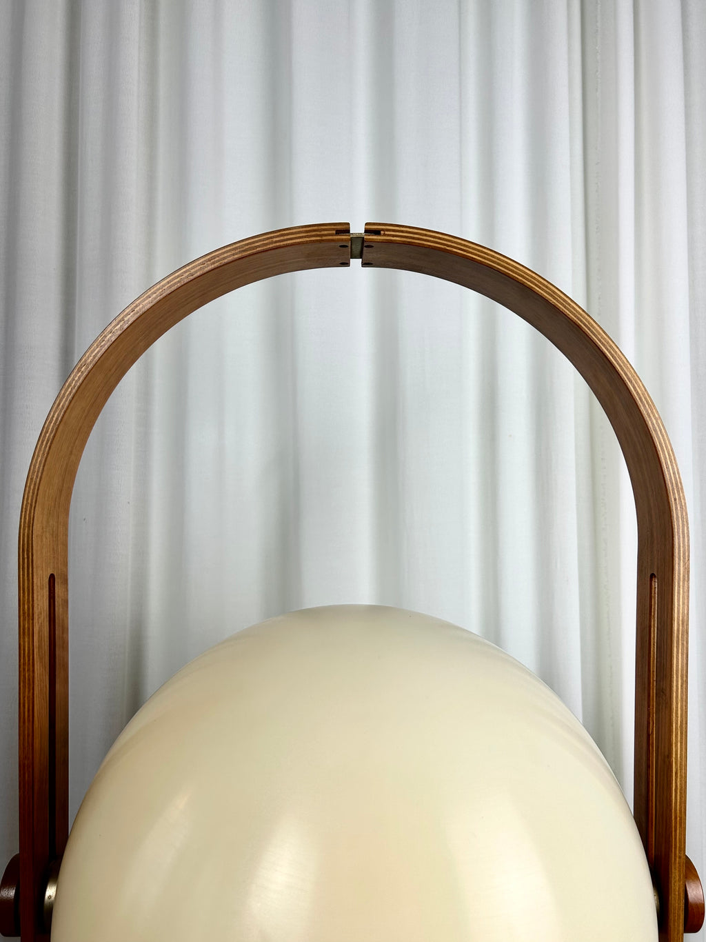 Arc detail of a vintage floorlamp in walnut from Temde, Switzerland 1960s