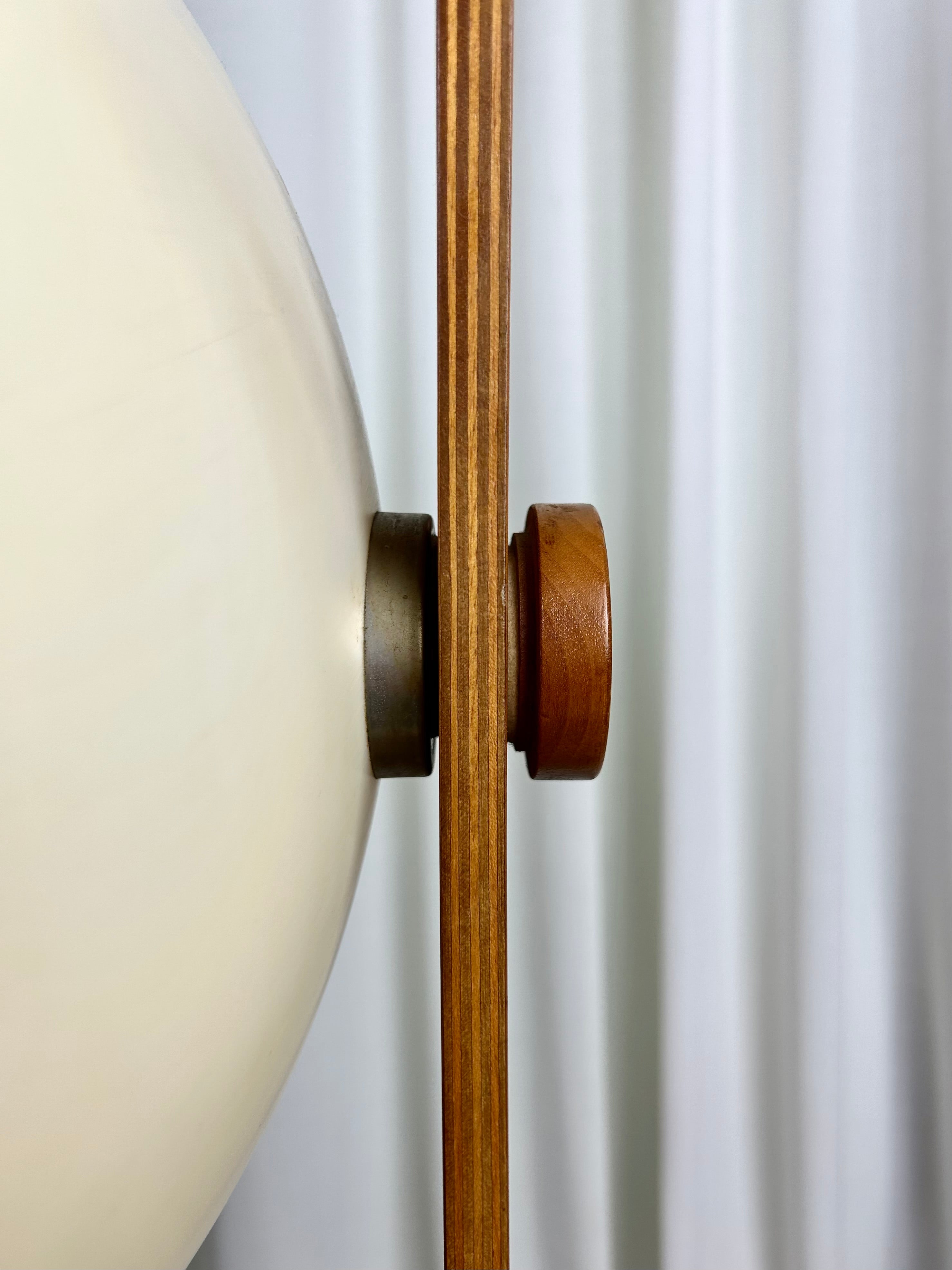 Adjustable mechanism detail view of a vintage floorlamp in walnut from Temde, Switzerland 1960s