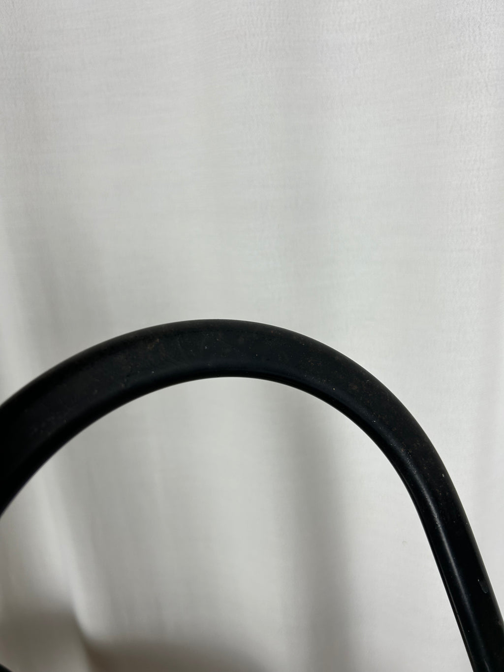 Two black foldable "Dafne" chairs by Gastone Rinaldi for the Italian manufacturer Thema, closeup