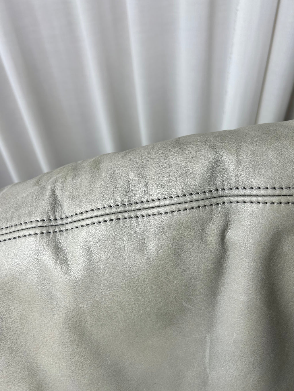 Closeup of leather and stitches from Air Sofa by Hain & Thome