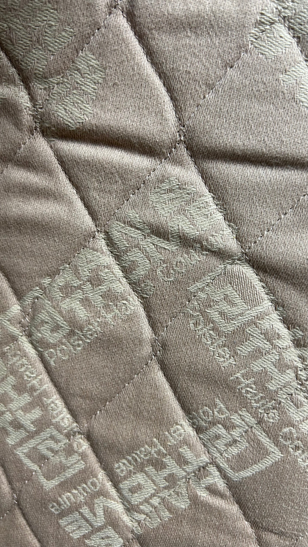 Closeup from logo on fabric from the Air Sofa by Hain & Thome