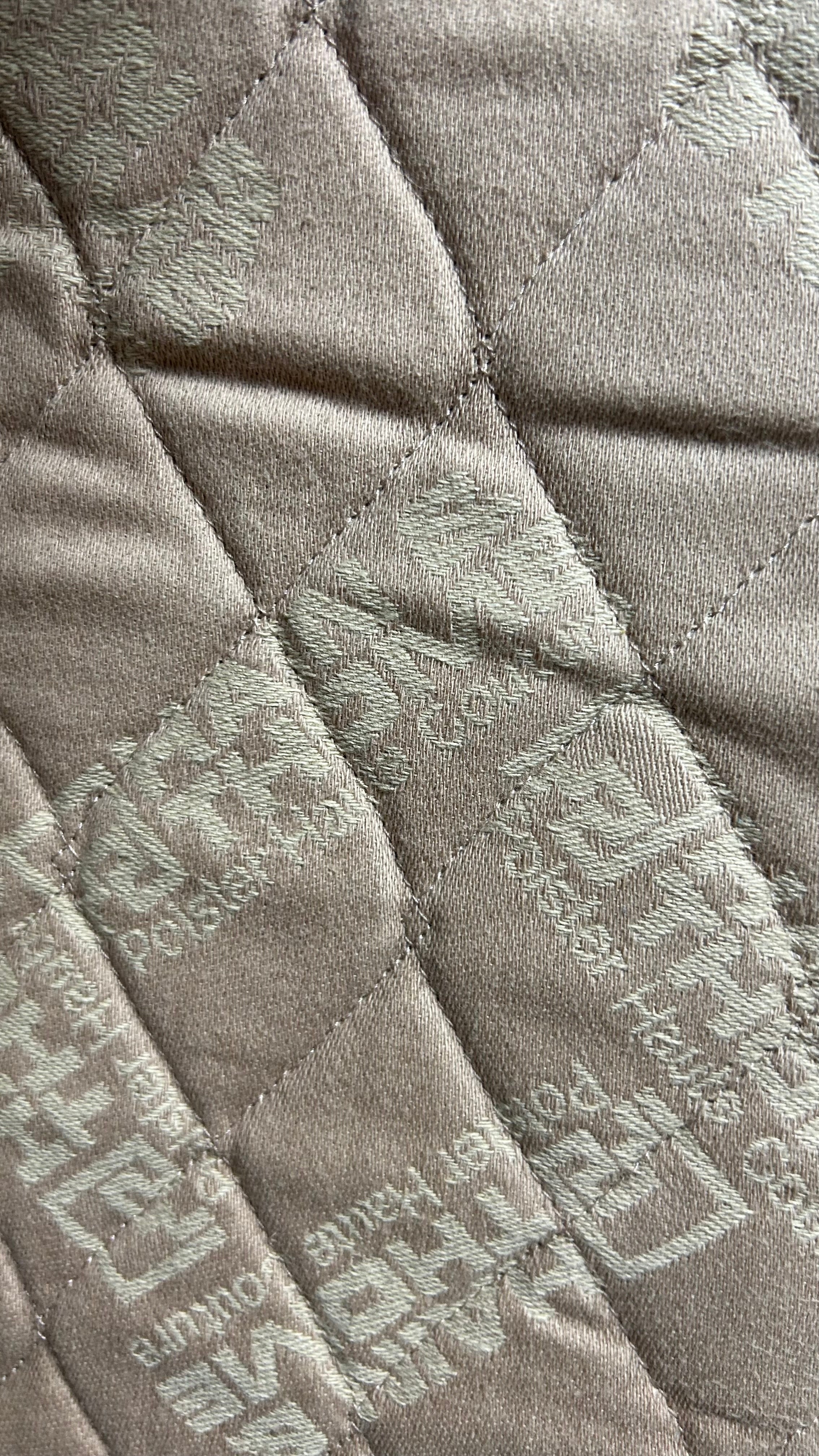 Closeup from logo on fabric from the Air Sofa by Hain & Thome