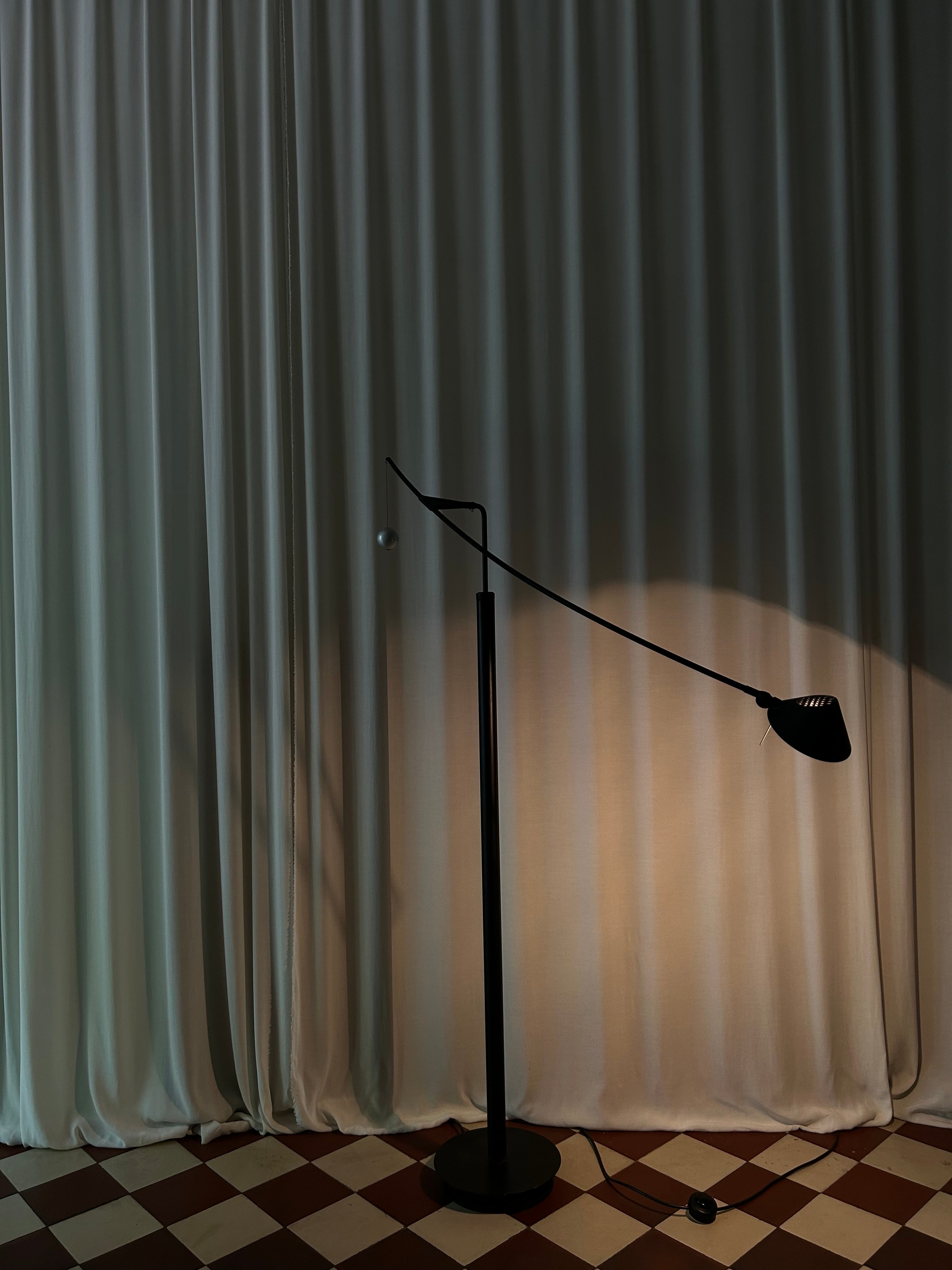 Nestore Lettura floor lamp by Carlo Forcolini for Artemide, 1988, dark setting with lowered lamp head