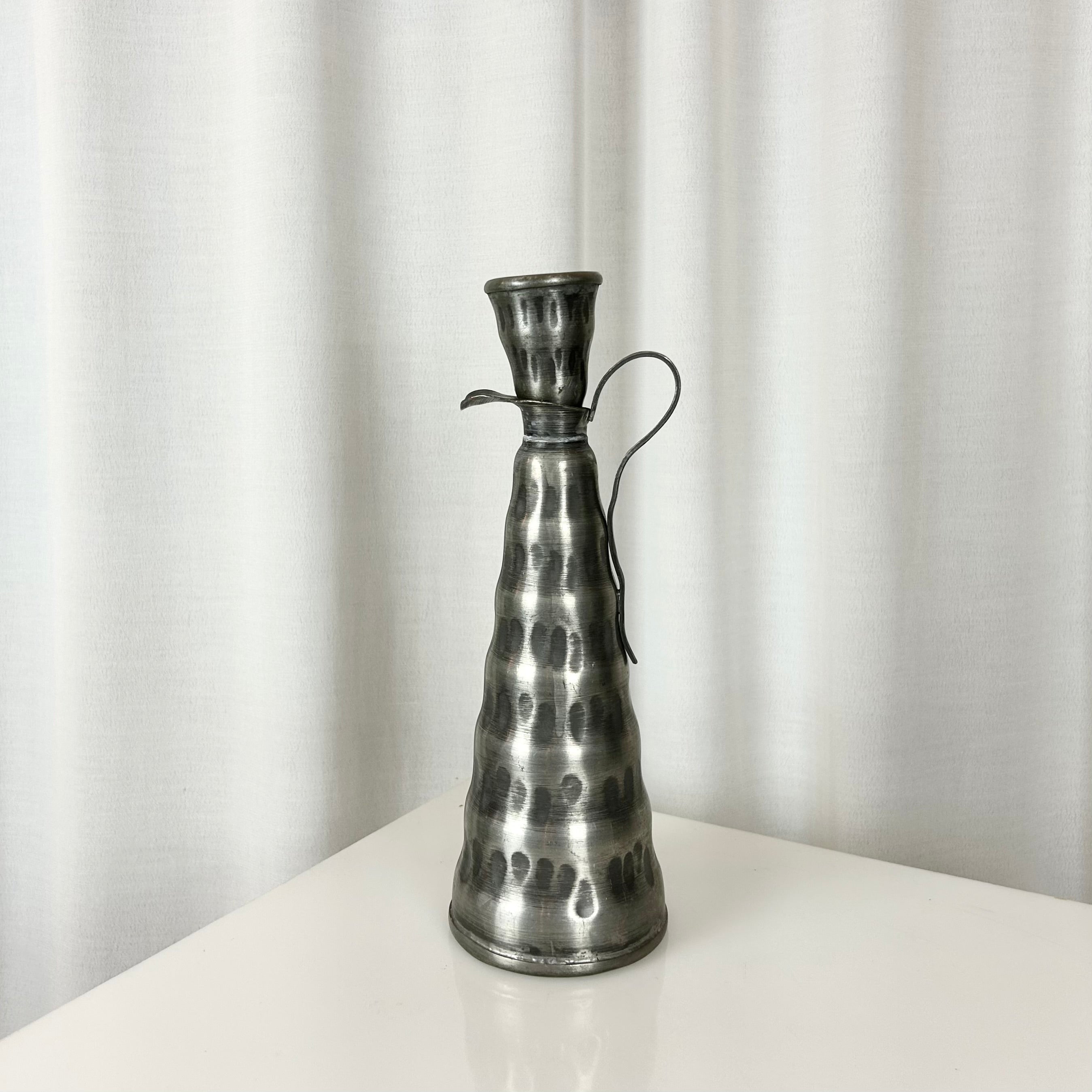 Norwegian pewter jug with hammered surface, conical shape and detachable lid, 29.5 cm tall