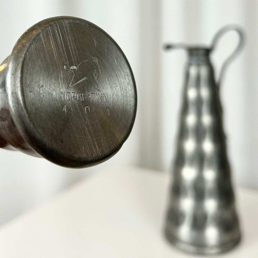Norwegian pewter jug with hammered surface, conical shape and detachable lid, 29.5 cm tall