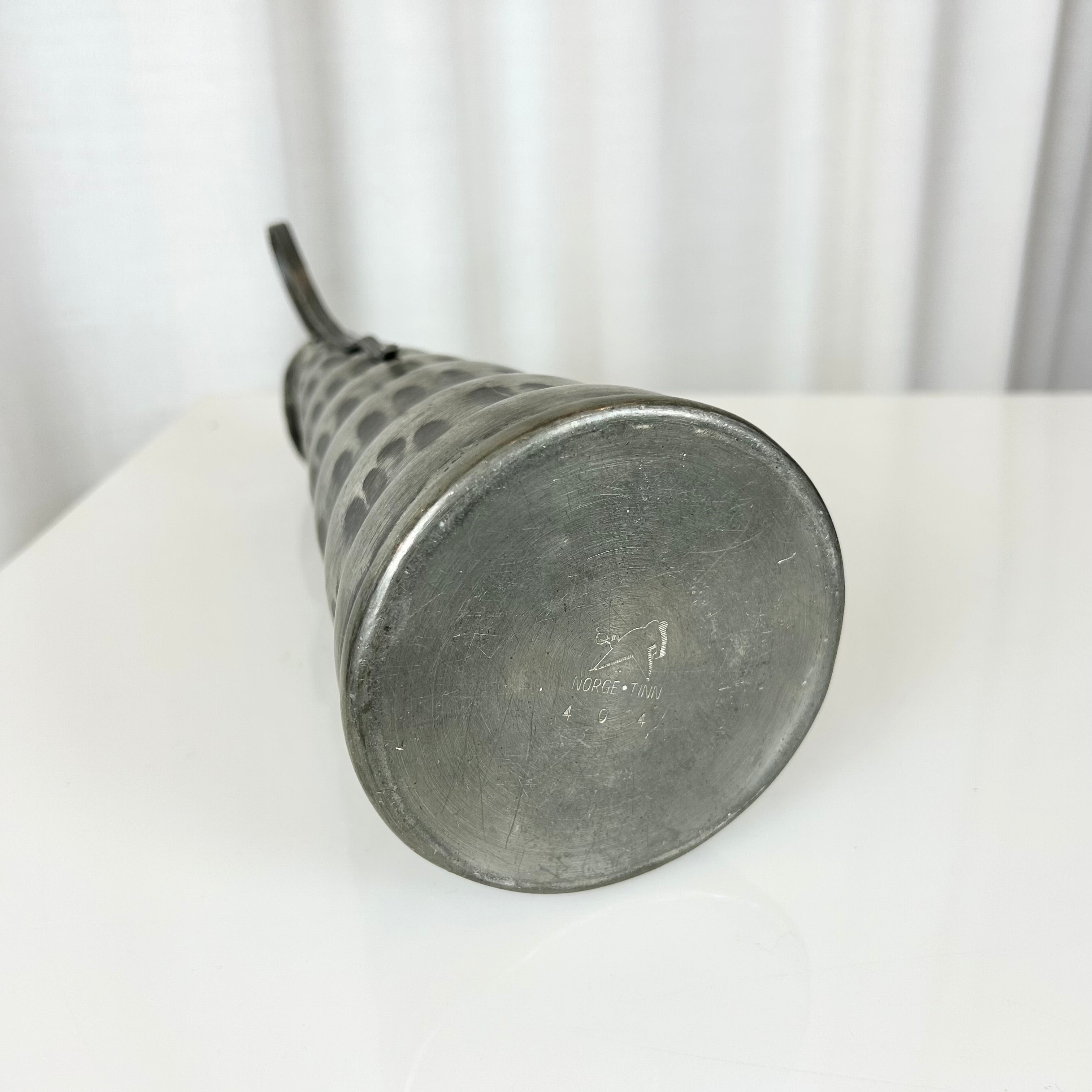 Norwegian pewter jug with hammered surface, conical shape and detachable lid, 29.5 cm tall