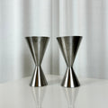 Set of two vintage DDR ABS stainless dessert glasses in sculptural double-cone design