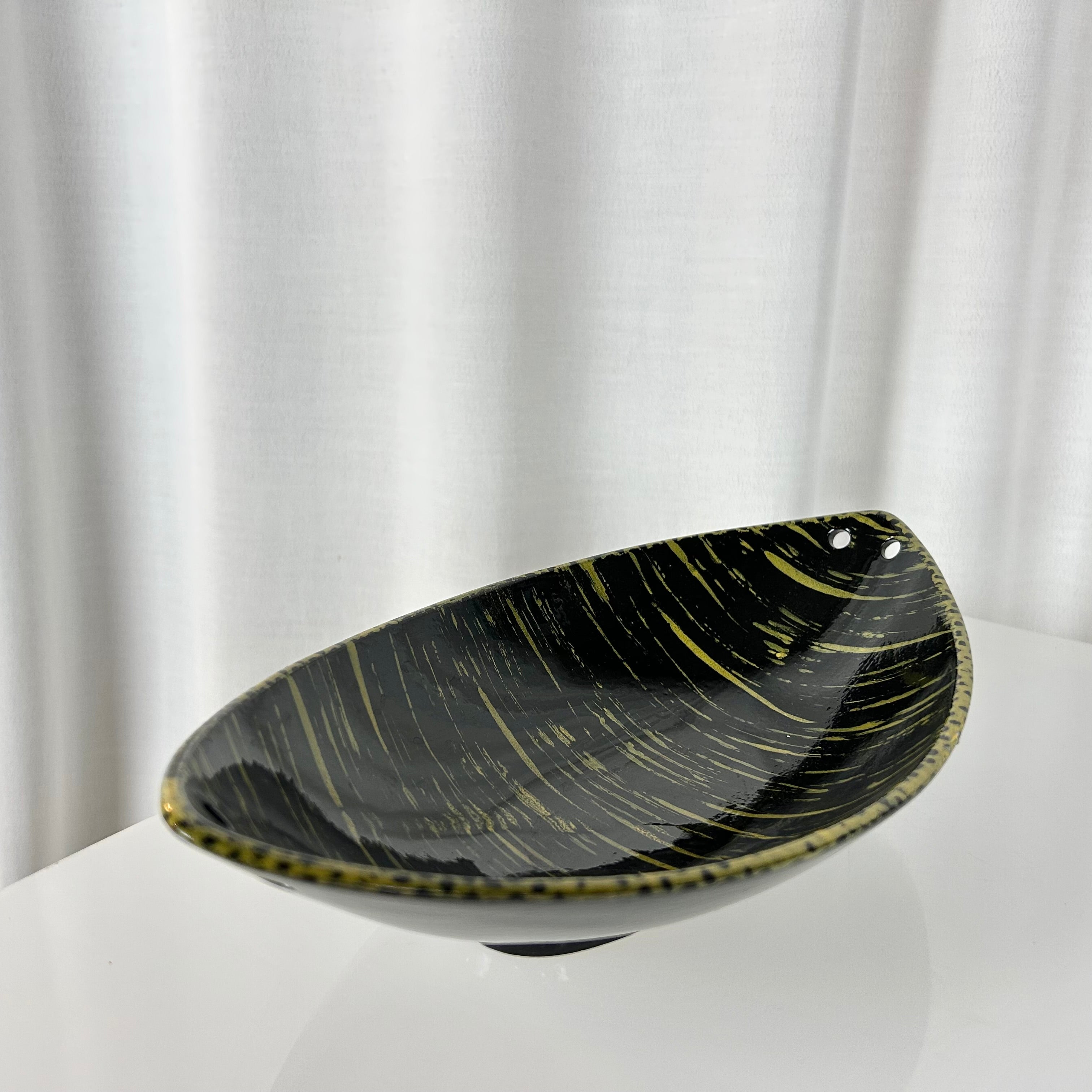  Vintage mid-century oval shaped ceramic bowl in black and yellow glaze, West Germany 1950s