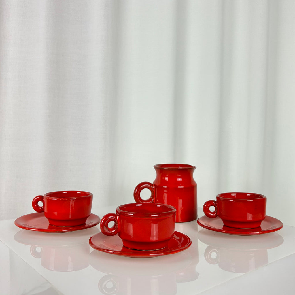 Vintage red ceramic coffee set from the 1970s with pot, sugar bowl, cups and saucers
