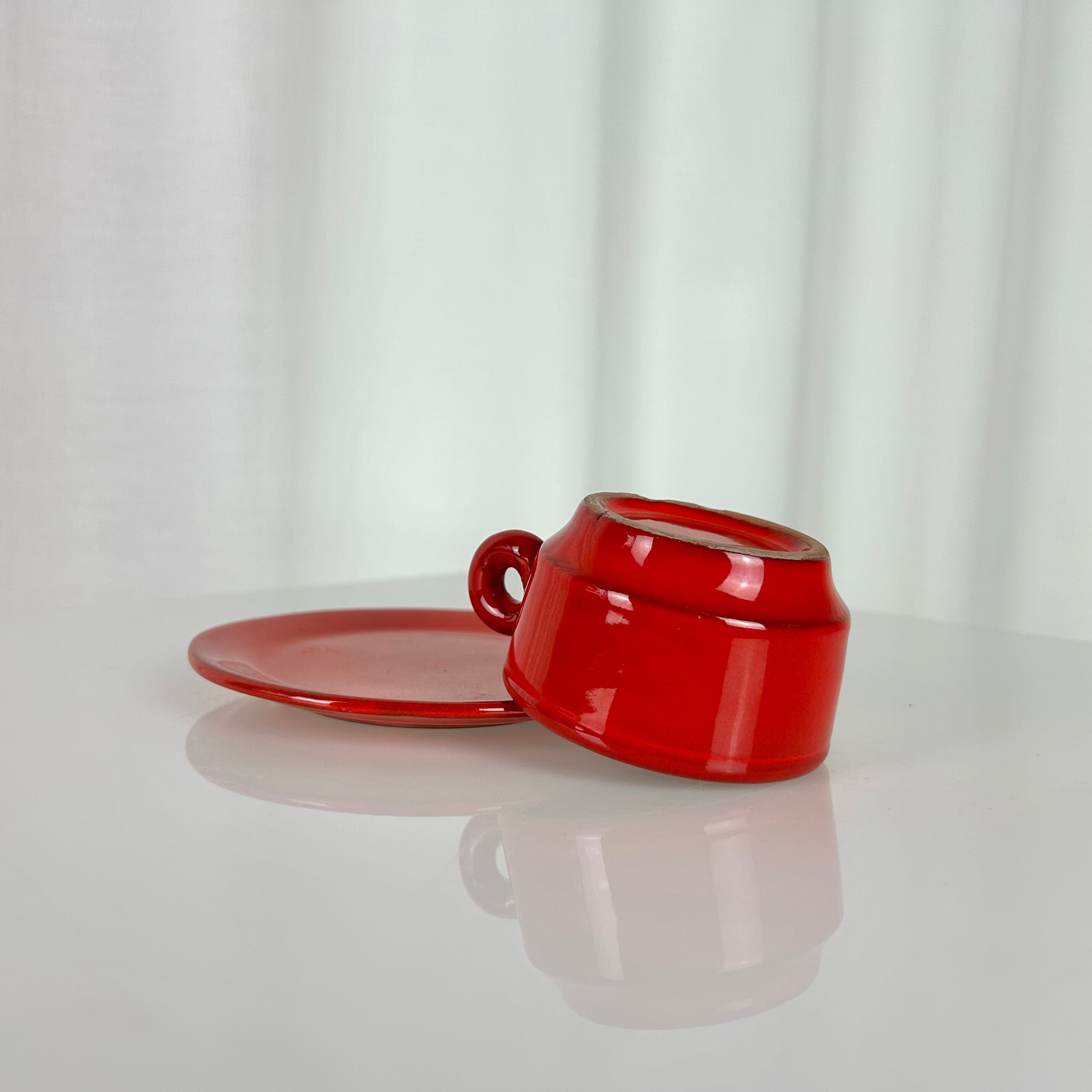 Vintage red ceramic coffee set from the 1970s with pot, sugar bowl, cups and saucers