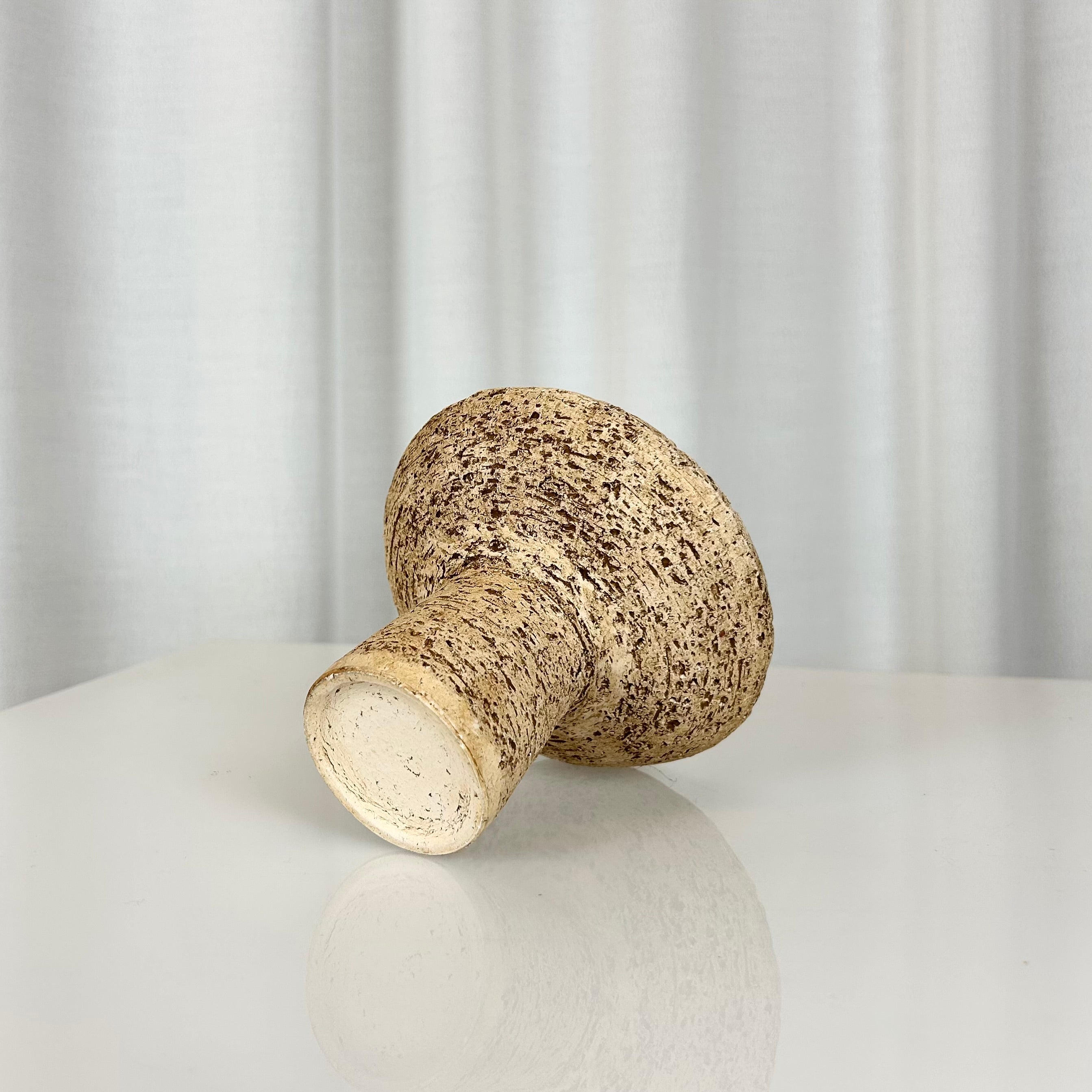 Vintage small textured stoneware pedestal bowl, seen from underneath