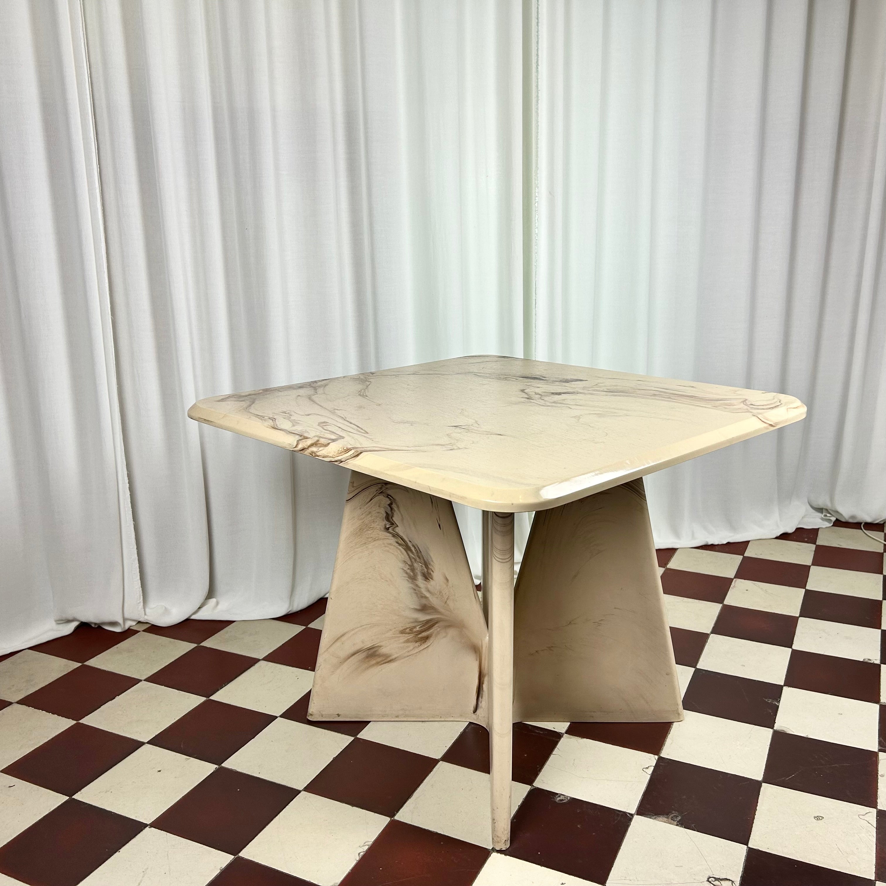 Vintage square shaped coffee table in marmorite from the 1980's, side view