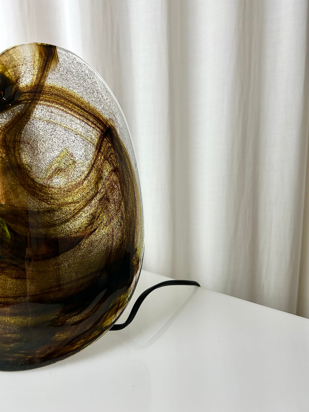 Vintage wall lamp by Per Lütken for Holmegaard, featuring a mouth-blown glass sconce with smoky brown swirls, 1970s Danish design.