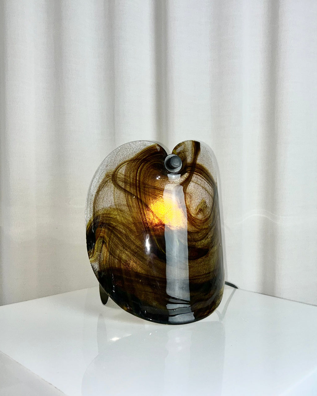 Vintage wall lamp by Per Lütken for Holmegaard, featuring a mouth-blown glass sconce with smoky brown swirls, 1970s Danish design.
